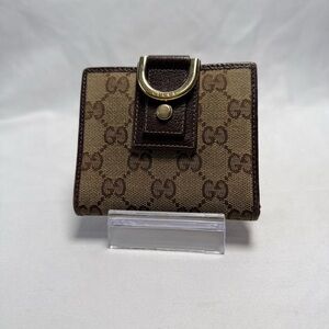 Gucci GG Canvas Bifold Wallet – Elegant & Iconic